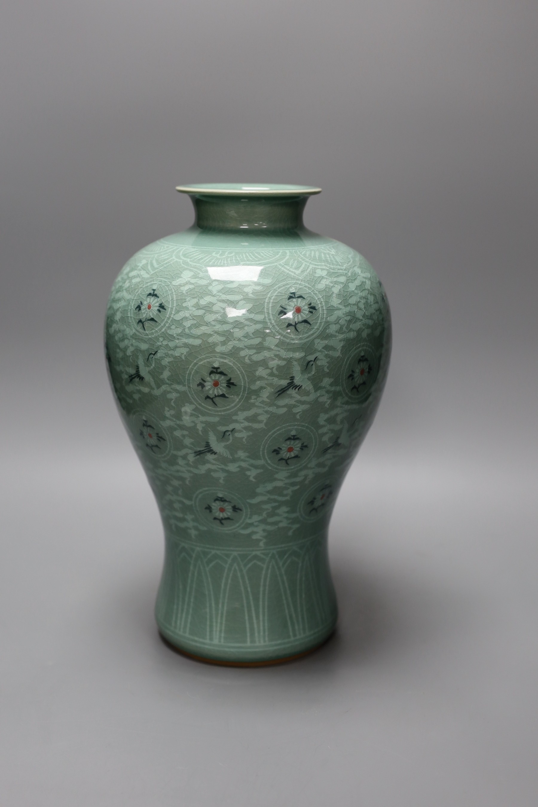 A Korean celadon ground baluster vase, 32cm
